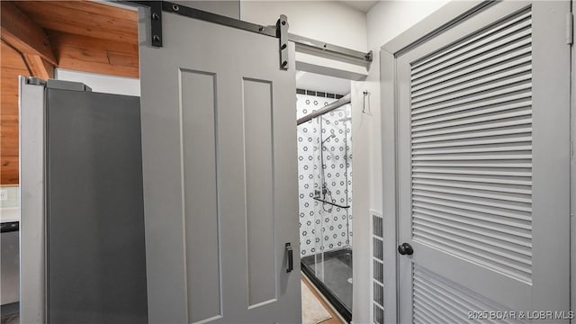 27086 Comanche Cv, Rocky Mount, MO 65072 - detailed view of a barn door and stainless steel appliances