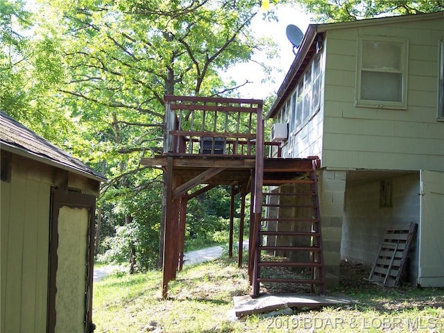 view of yard featuring a wooden deck