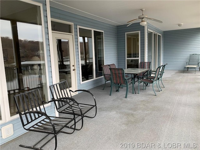 view of patio / terrace featuring ceiling fan