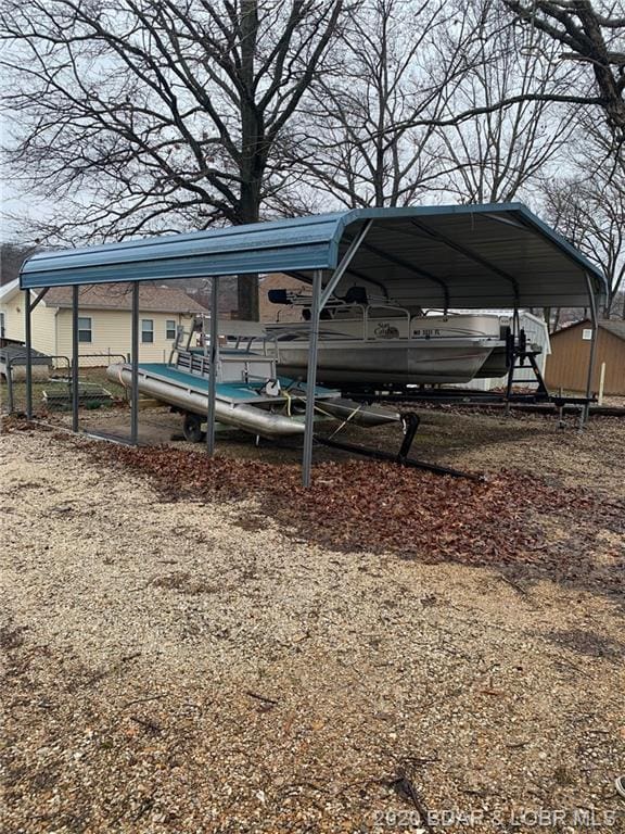 exterior space featuring a carport