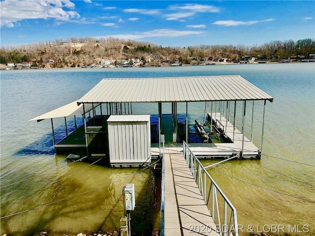 view of dock featuring a water view