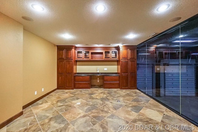 interior space featuring light tile floors