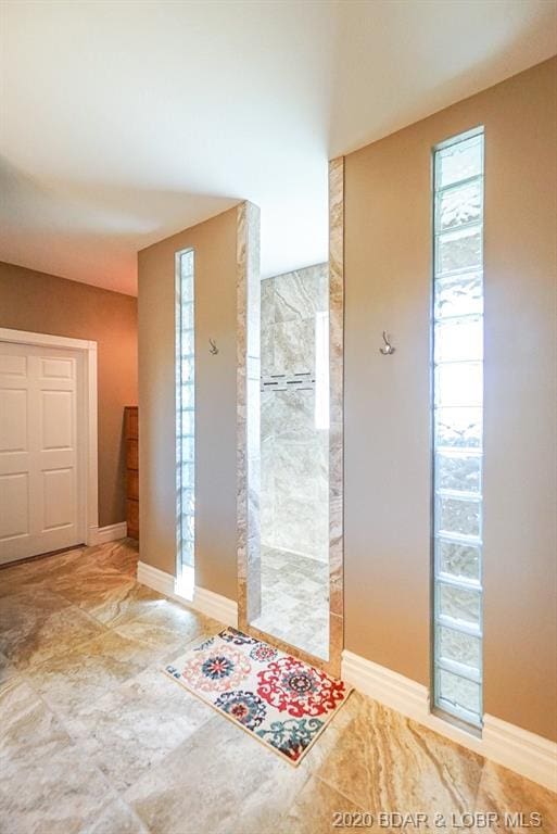 entryway featuring light tile floors