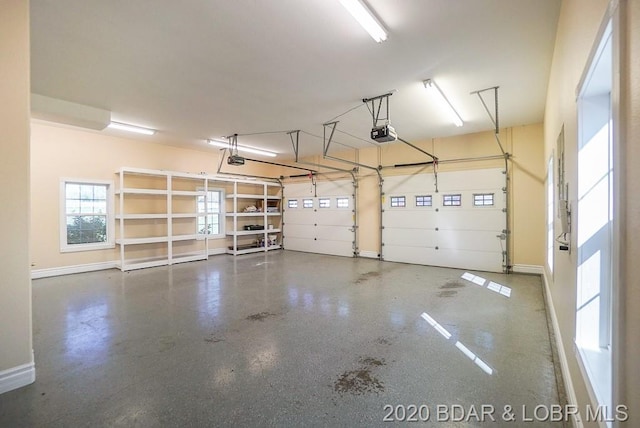 garage featuring a garage door opener