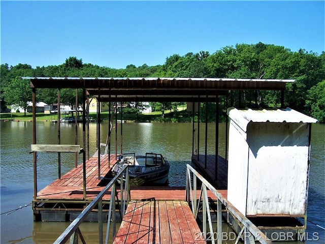 dock area with a water view