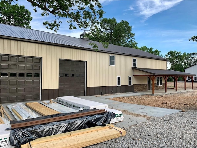 exterior space with a garage