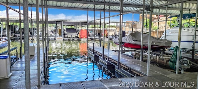 view of dock with a water view