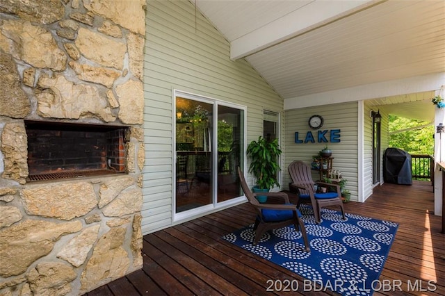 wooden deck featuring area for grilling