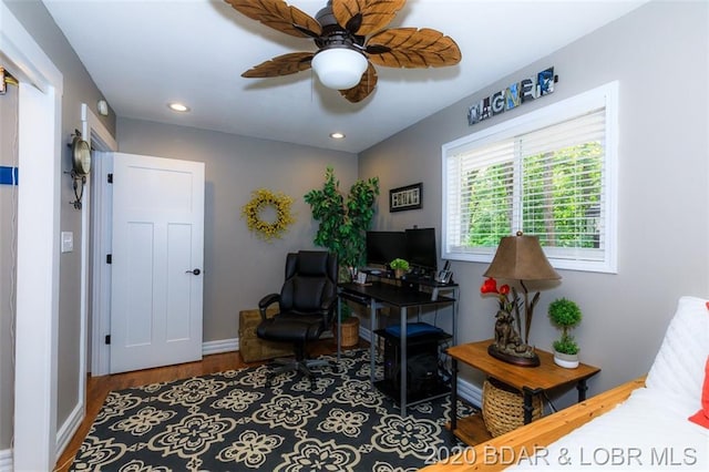 interior space featuring dark hardwood / wood-style floors and ceiling fan