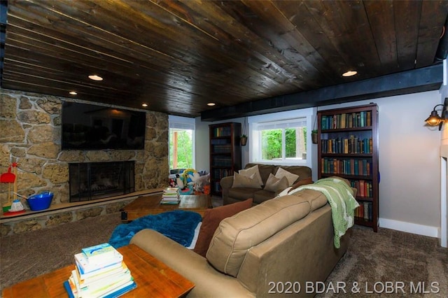 carpeted living room with wood ceiling and a fireplace