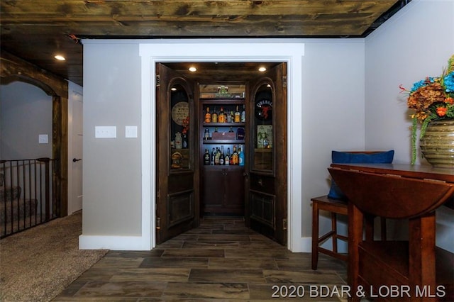 interior space with dark colored carpet