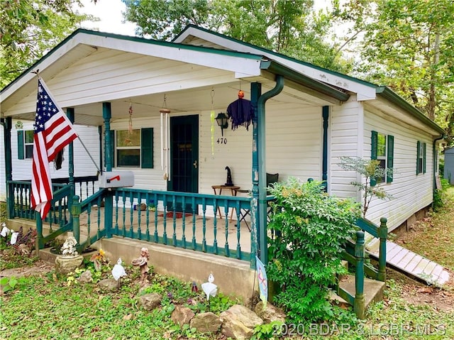 view of front of home featuring covered porch