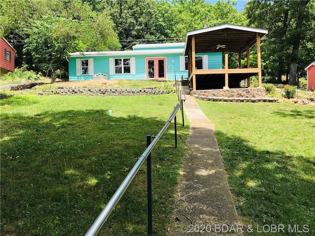 view of front of home with a front lawn