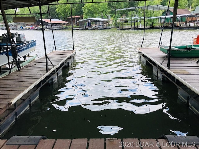 view of dock with a water view