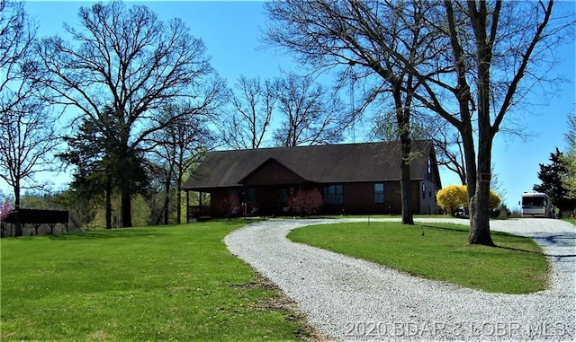 view of front of home with a front lawn