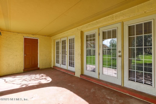 view of patio featuring french doors