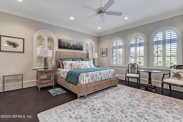 bedroom with crown molding, ceiling fan, and dark wood-type flooring