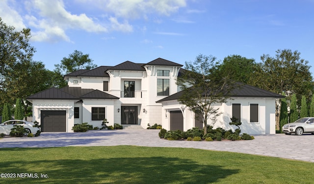 view of front facade featuring a front yard and a garage