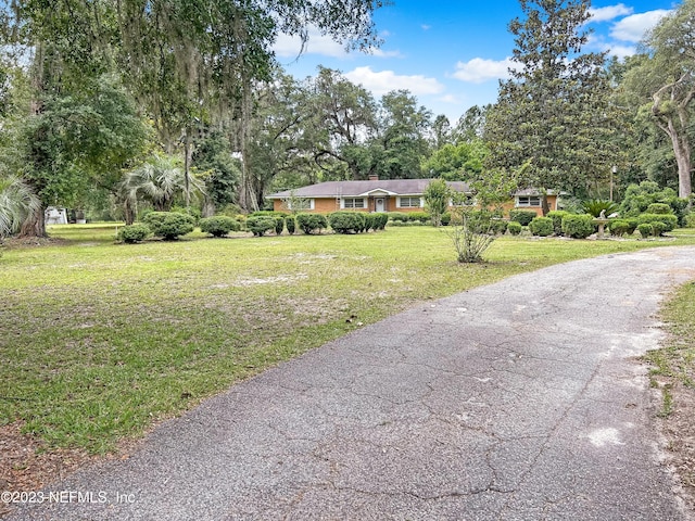 view of front of house with a front lawn