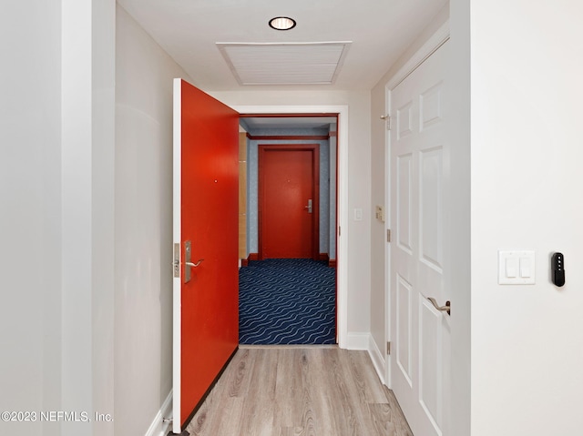 corridor featuring light wood-type flooring