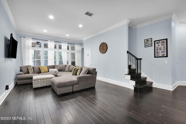 living room with ornamental molding