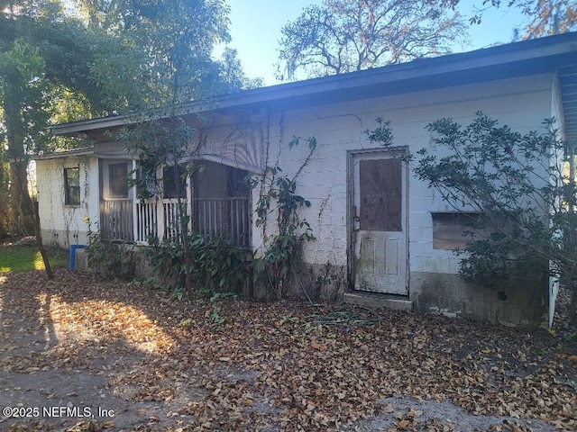 exterior space featuring covered porch