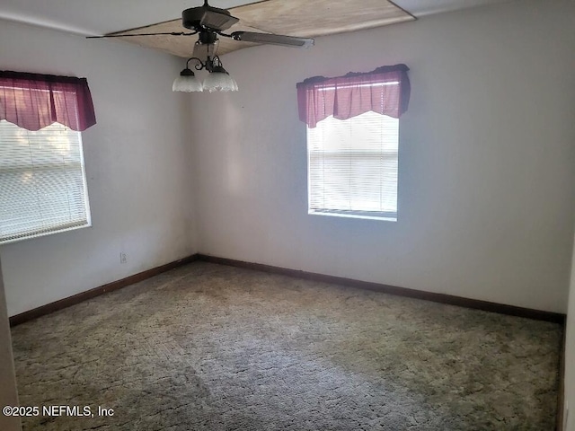 unfurnished room featuring ceiling fan