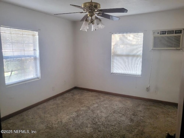 empty room featuring ceiling fan, a wall mounted AC, and carpet floors