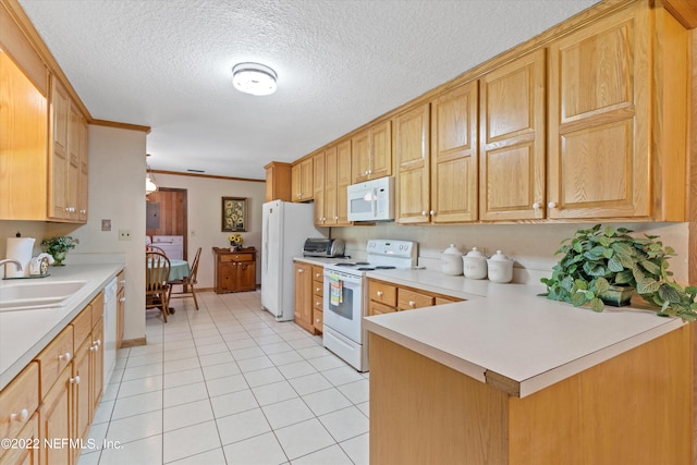 kitchen with white appliances, sink, light tile patterned flooring, ornamental molding, and a textured ceiling