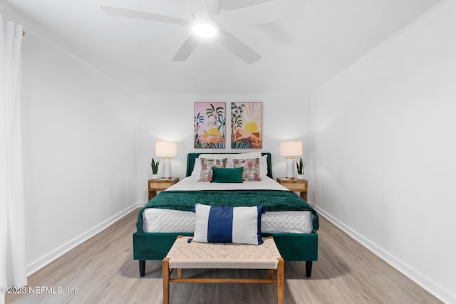 bedroom featuring ceiling fan and hardwood / wood-style floors