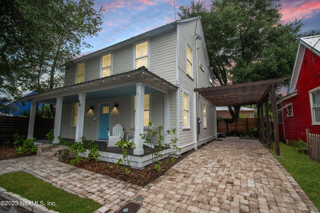 view of front of home featuring covered porch