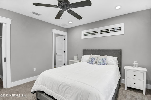 bedroom featuring ceiling fan and carpet