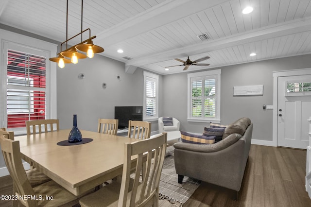 dining space featuring beamed ceiling, ceiling fan, wood ceiling, and hardwood / wood-style floors