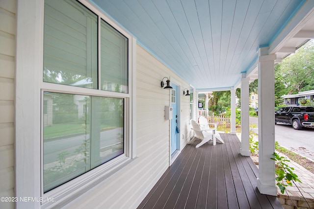 wooden deck featuring a porch