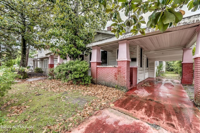 view of home's exterior with covered porch