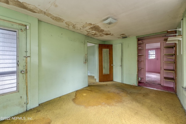 spare room featuring carpet flooring