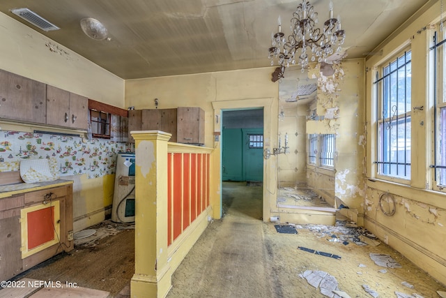 kitchen with an inviting chandelier