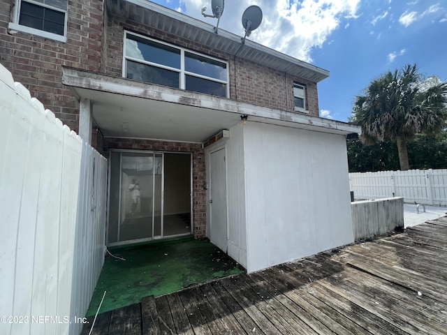 exterior space featuring a wooden deck