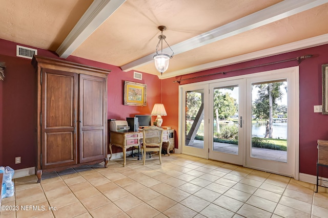 tiled office with a textured ceiling, beam ceiling, and french doors