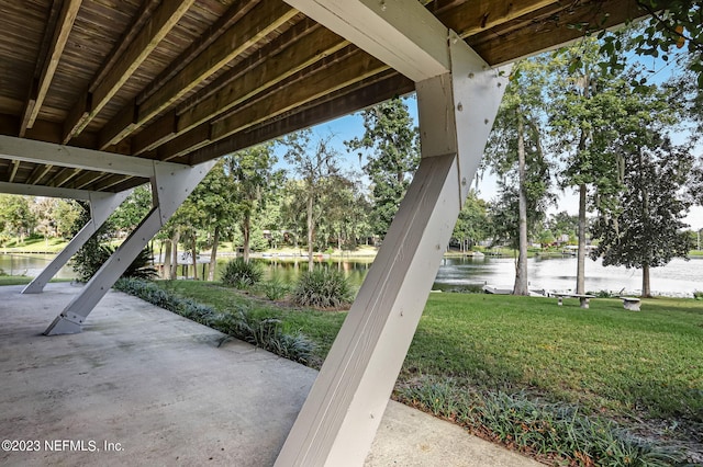 view of patio featuring a water view