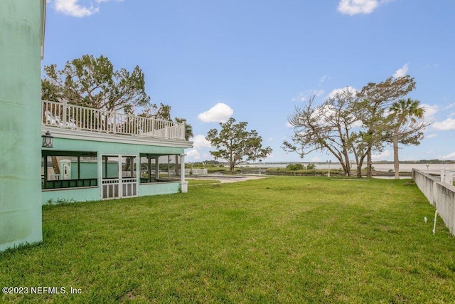 view of yard featuring a sunroom