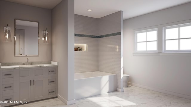 full bath featuring a bath, marble finish floor, vanity, and baseboards