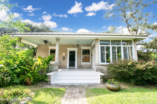 view of front of home with ceiling fan