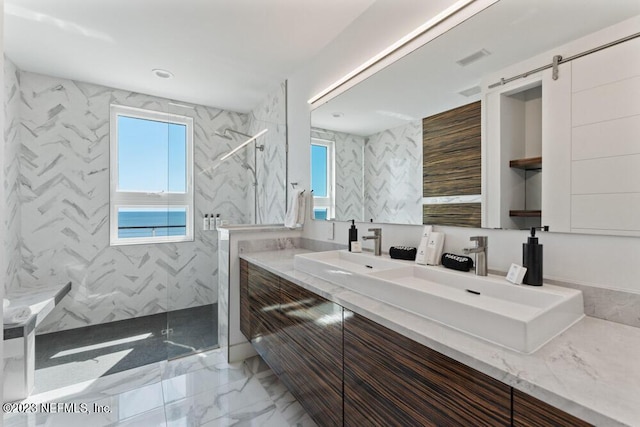 bathroom featuring vanity and walk in shower