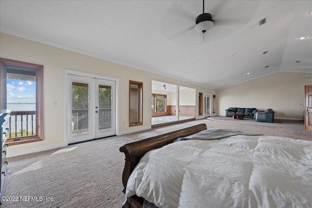 carpeted bedroom featuring access to exterior, vaulted ceiling, crown molding, ceiling fan, and french doors