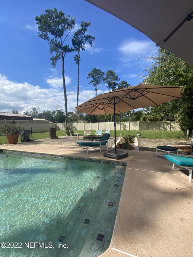 view of pool with a patio area