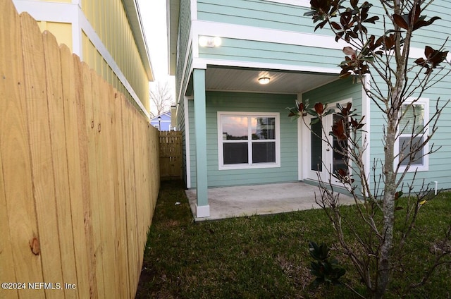 view of property exterior featuring a patio