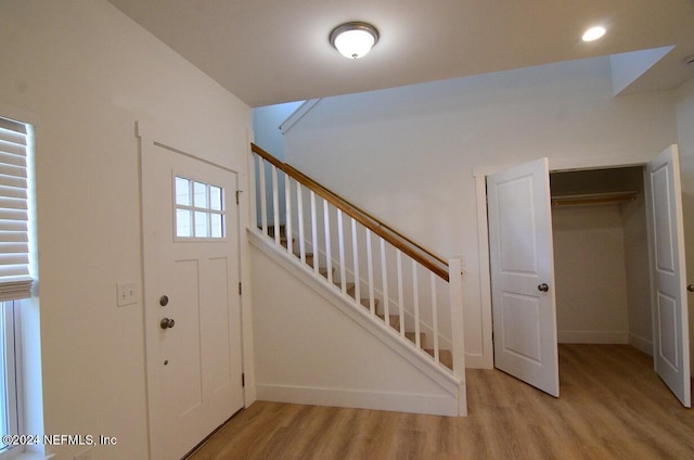 entrance foyer with light hardwood / wood-style floors