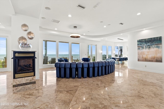 living room featuring a water view