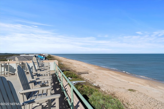 property view of water featuring a beach view